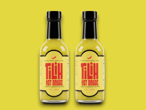 Lemon Pepper Hot Sauce bottle for chicken and seafood, bold spicy flavor